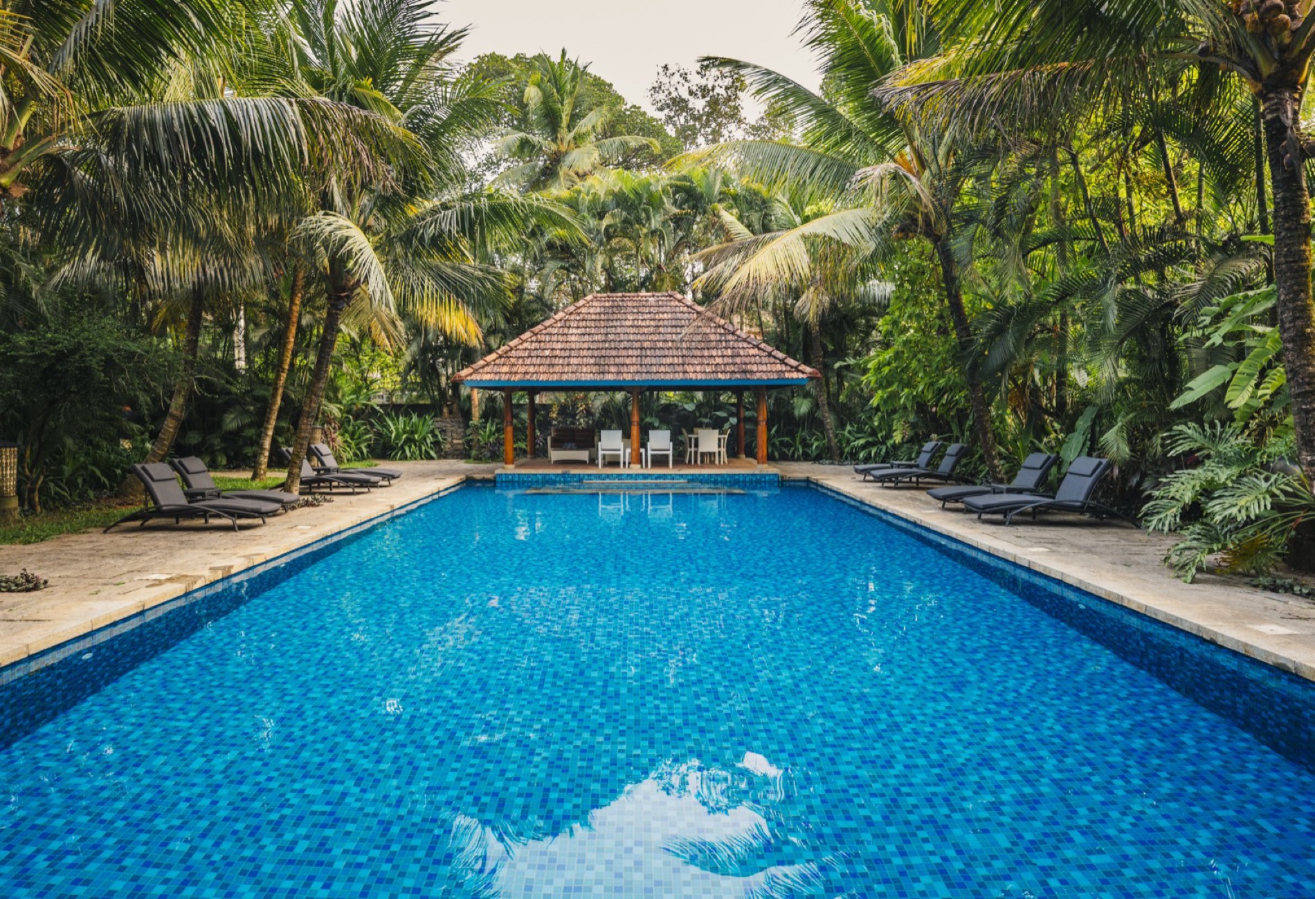 The estate pool and poolside pavilion